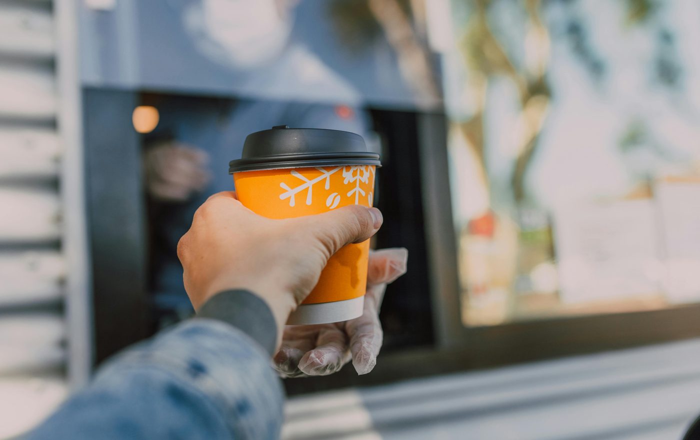 Order handed to a customer at a drive-through service window